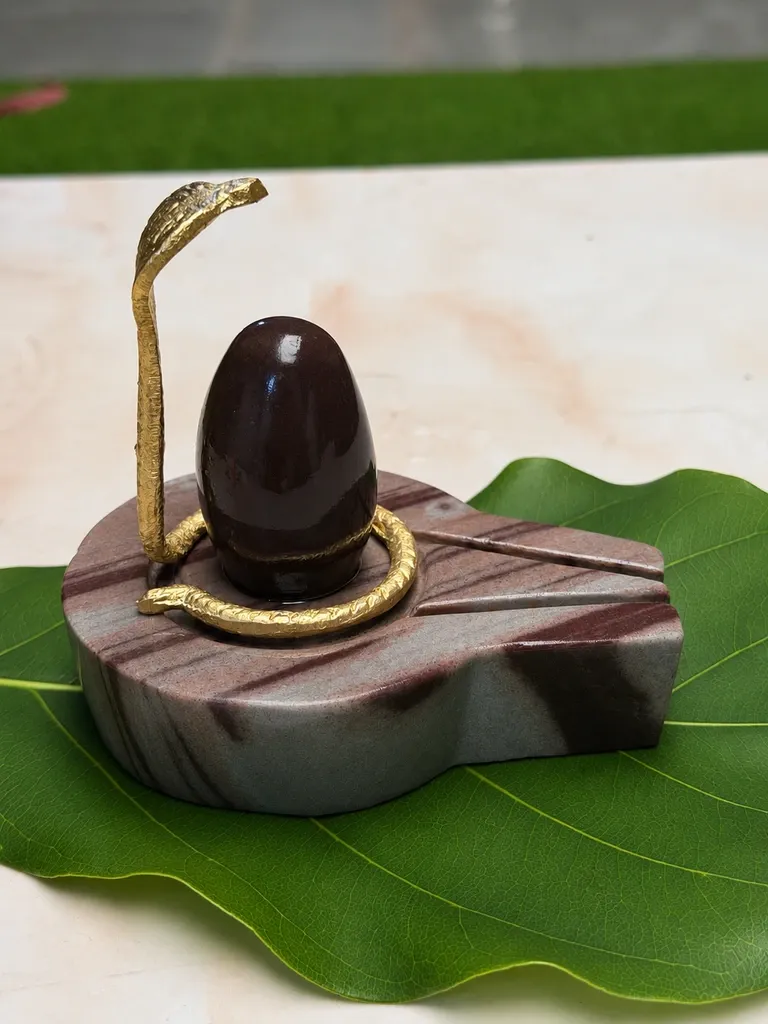 Buy Thumb Small Size Original Swayambhu  Narmadeshwar Shivling With Shakti jaladhari and naag